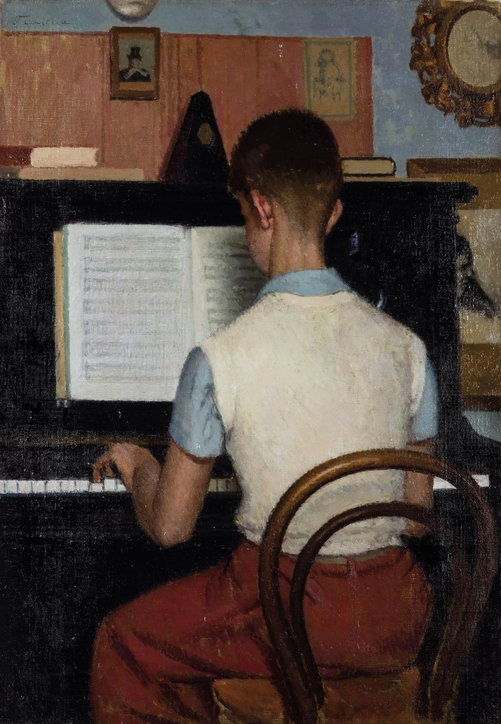 Il figlio Benedetto intento a esercitarsi per la licenza di quinto anno al pianoforte